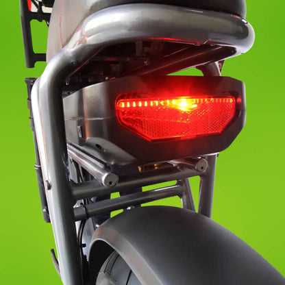 Close-up view of the rear light on the Skinnybike Tourwheel T6, highlighting its design and functionality for enhanced visibility during nighttime rides